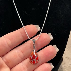 18” sterling silver with amber colored silver glass pendant